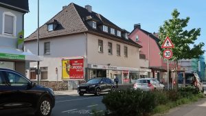 Wir bringen Sie in Menden GROSS raus - Plakat wirkt!