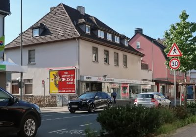 Wir bringen Sie in Menden GROSS raus - Plakat wirkt!